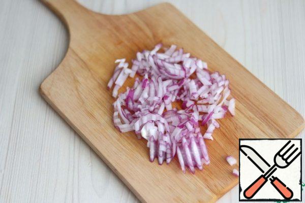 Chop the red onion into small pieces.