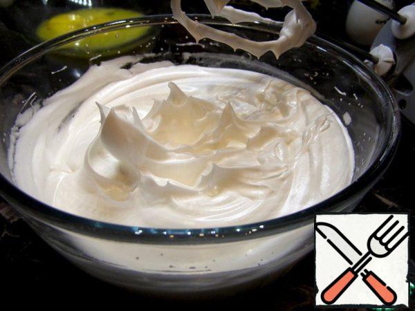 Divide the eggs into yolks and whites and beat the whites into a strong foam. For better whipping, I put the whites and whisk of the mixer in the freezer for 5 minutes and always add a pinch of salt and a few drops of lemon juice or vinegar to the whites.