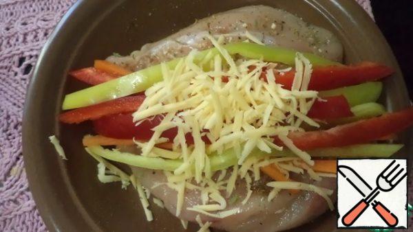 Add strips of bell pepper and sprinkle with cheese again.