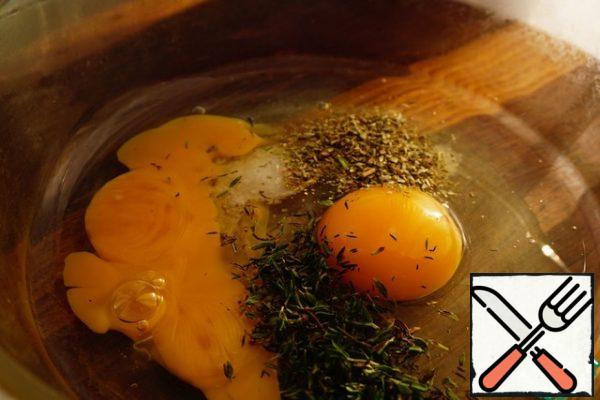 Add salt, thyme and dried oregano.