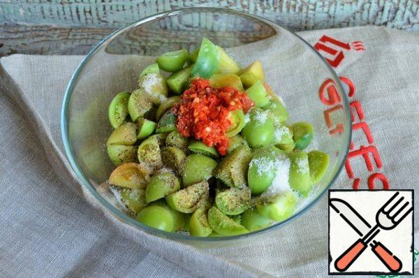 Put the tomatoes in a bowl, add sugar, salt, ground black pepper, and hot pepper paste.