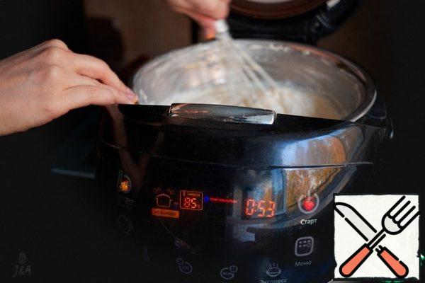 Put on a water bath. The fire under a pot of water should be the weakest. The bottom of the bowl with sour cream should not touch the water. Simmer sour cream with sugar for 1 hour, stirring occasionally.
