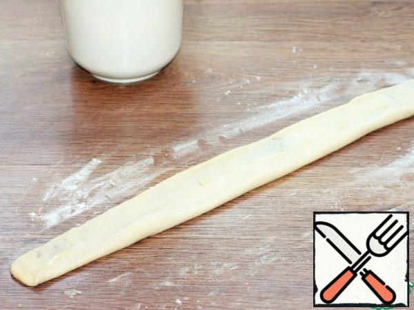 Roll the tortilla into a long roll.