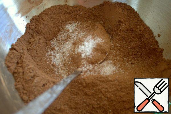 Mix the dry ingredients for the chocolate cake.