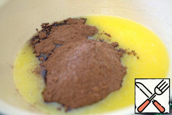 Pour the dry mixture into the butter.
