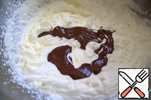 A spoon to transfer the chocolate into the cream.