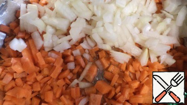 Finely chop the onion and carrot.