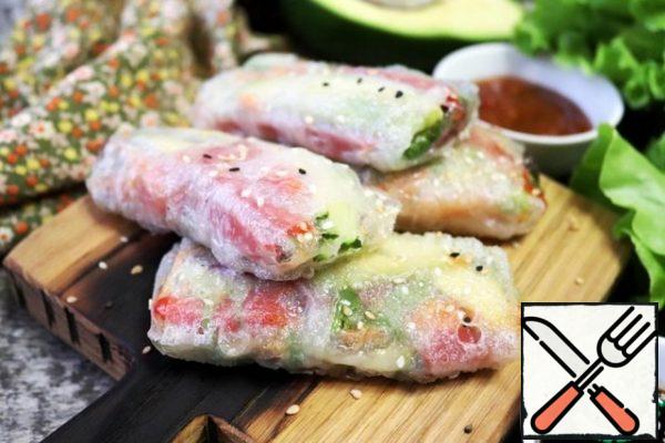 Serve, sprinkled with sesame seeds and herbs, with soy sauce or other sauce. 
