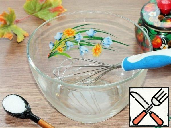 In warm water (150 ml), dissolve the sugar (1 tsp).