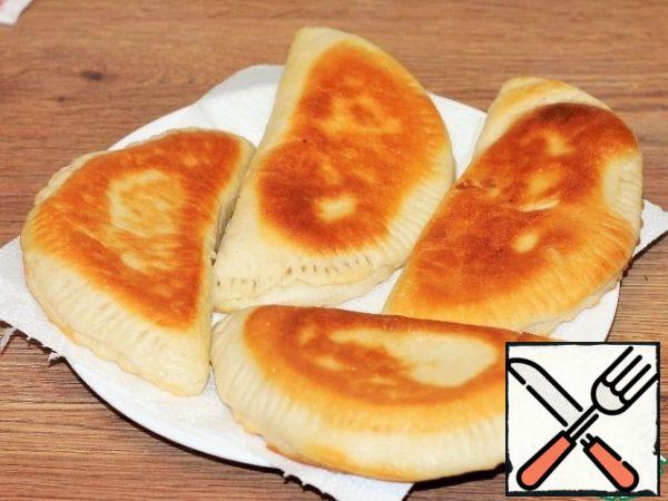Spread the tortillas on a napkin to glass the excess oil.