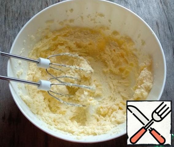 Combine softened butter with sugar and beat with a mixer until creamy.