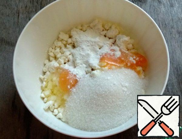 While the cookies are being prepared, combine the cottage cheese, sugar, eggs, and corn starch in a container.