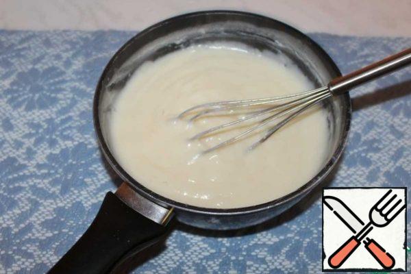 Pour the mixture into the remaining milk and mix. Cook until thick, stirring constantly.