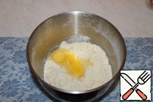Add eggs. And knead the dough.