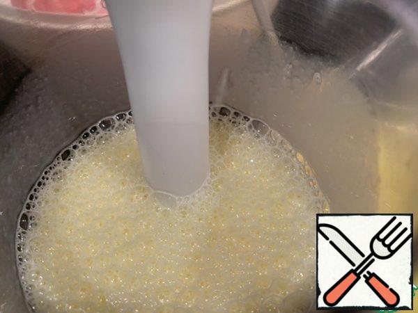 Beat the eggs with salt, pepper and sour cream. Pour this mixture all over the cake.
