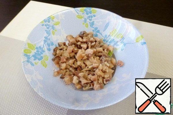 Lightly salted herring cut into small cubes. I have one herring fillet (half a fish), without skin and bones.