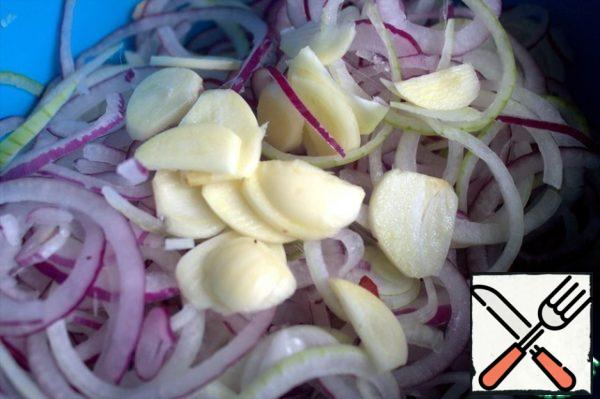 Add garlic slices.