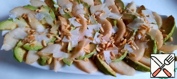 Gently drizzle the fruit with olive oil, finely grate the Parmesan, and garnish with pine nuts. You can add a little salt and pepper. I didn't salt it.