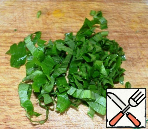 Finely chop the celery.