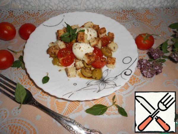 Put the salad on a platter, sprinkle with crackers, sprigs of oregano.