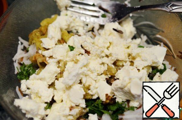 Mash the cheese with a fork and add to the rice.