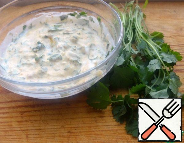 Mix yogurt, salt, curry, grated ginger and garlic, and chopped herbs in a bowl.