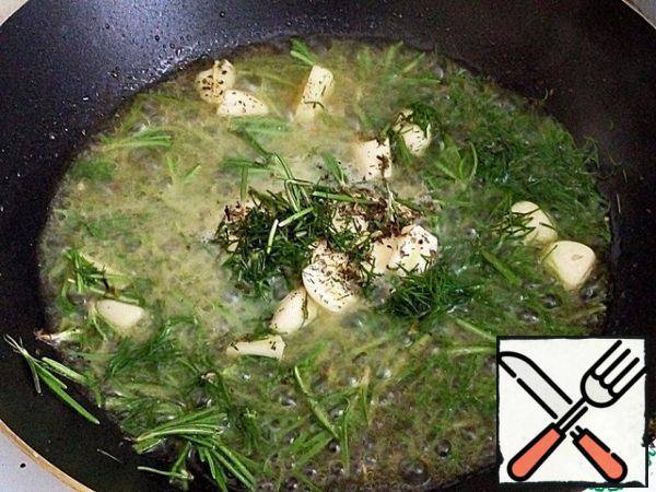Heat the butter in a frying pan, add all the herbs, part of the chopped dill, garlic cloves and pass over a low heat for about 2-3 minutes.