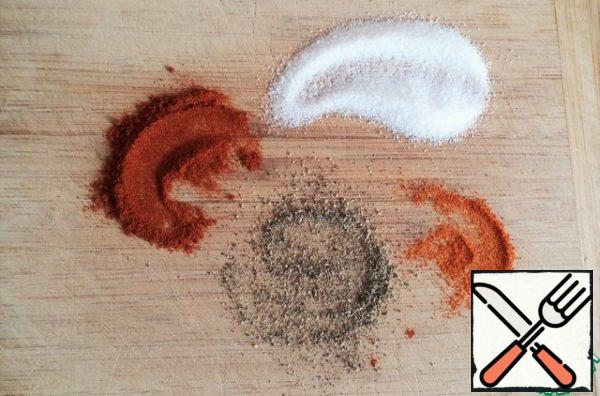 Sprinkle with spices to taste. I have paprika, Cayenne pepper, black pepper, salt.