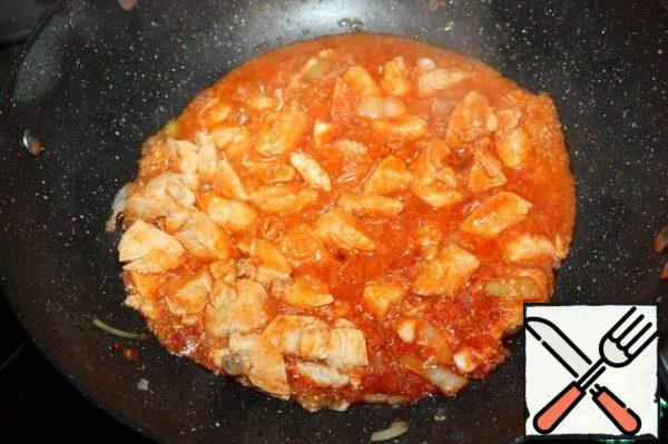 Return the chicken to the pan. Stir and cook for a couple of minutes.