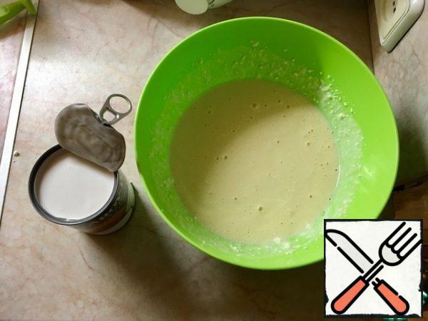 Pour in a jar of coconut milk. Stir.