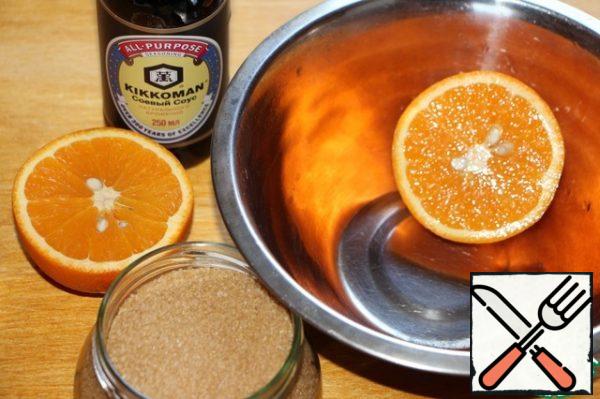 Squeeze the juice from 1 large orange.
