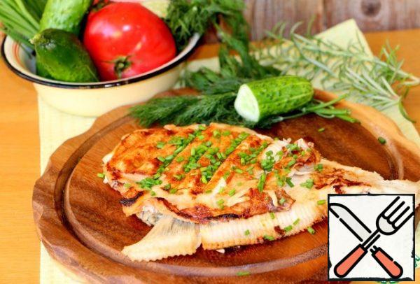 Serve the fish with fresh vegetables.