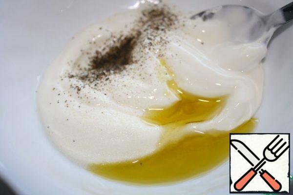 Mix the yogurt with salt and pepper, then add the butter and beat until creamy.