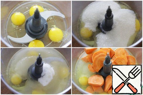 In the bowl of a blender or food processor, put the ingredients in the following order: eggs, sugar, butter, carrots.
