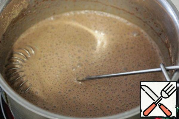 Constantly stirring, bring the glaze to the desired density.