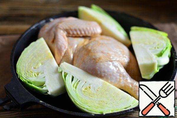 Attach parts of the cabbage to the chicken.
