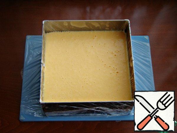Pour the filling over the frozen layer and refrigerate for about an hour to stabilize.