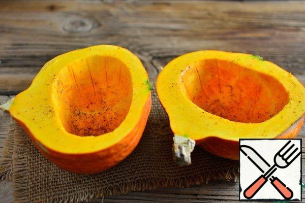 Butter the pumpkin inside and sprinkle with spices and salt and leave for the time of marinating the meat.