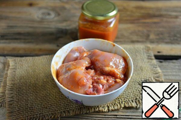 Marinate chicken thighs in ketchup for 30 minutes.