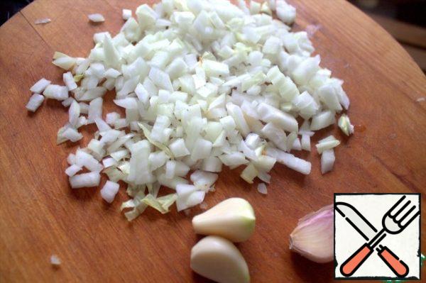 Chop the onion and garlic.