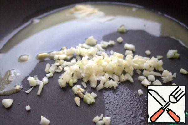 Fry the garlic separately in butter.