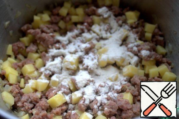 Stir and add flour.