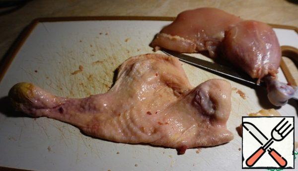 Carefully remove the skin from the hams.