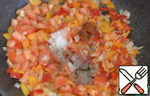 Add salt, cumin, paprika, and black pepper.