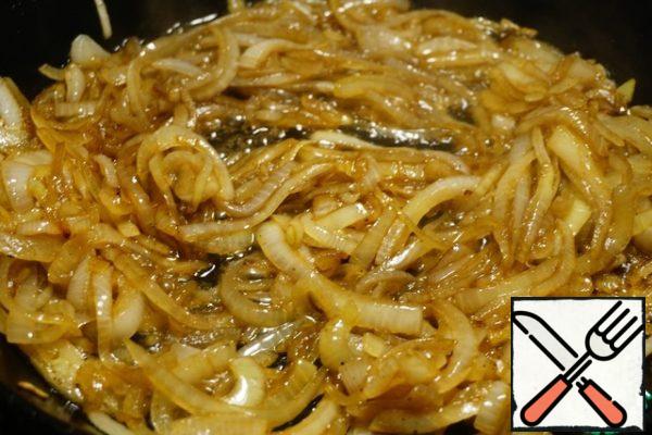 Add soy sauce and balsamic vinegar to the onion. Simmer for a few minutes until the liquid evaporates.