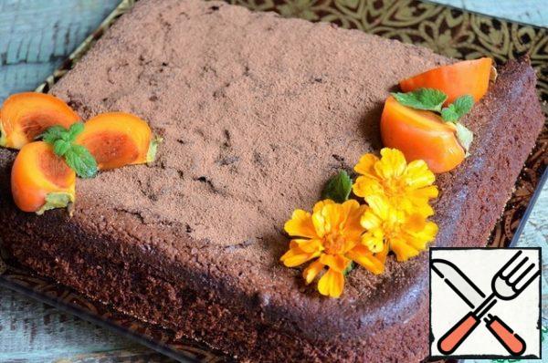 In the original cake to cover with chocolate icing, I simplified.
Sprinkled the top with Nesquik cocoa and garnished with persimmon slices.