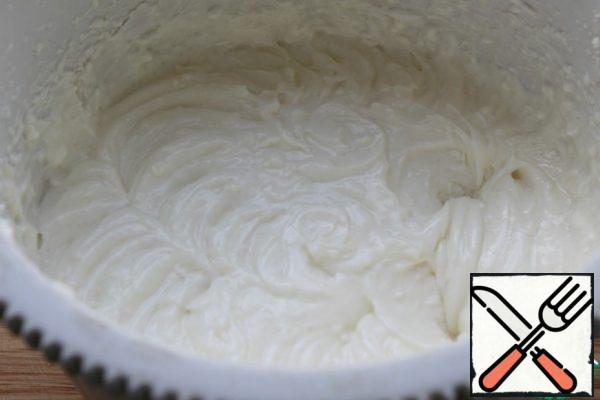 Add sour cream sugar and cream.
Mix with a mixer until smooth.
