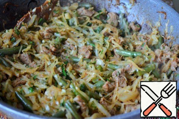Season with chopped herbs, garlic, butter, and mix.