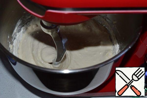 Mix warm water with yeast, salt and 300 gr. flour.
Stir until smooth.