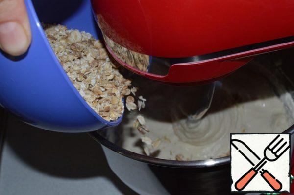 Add the flakes and butter and mix.